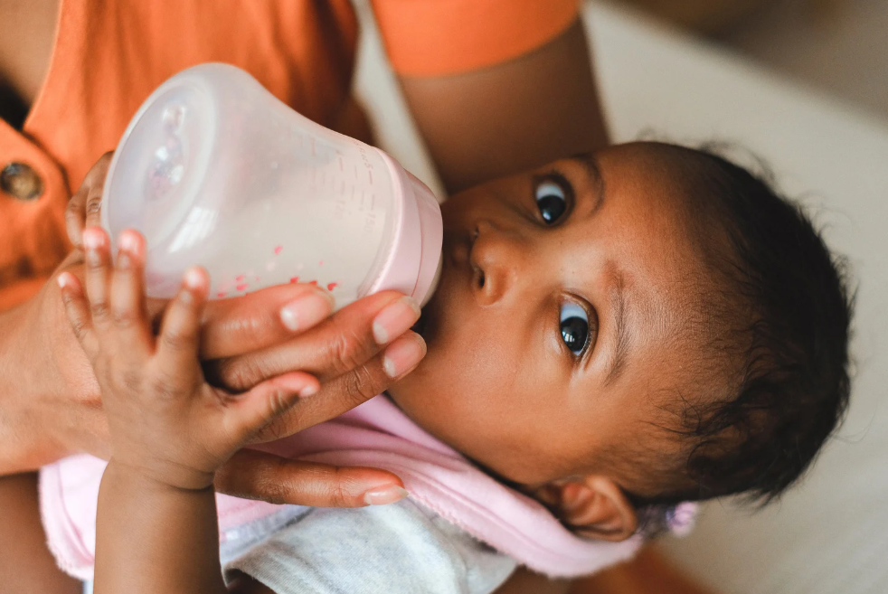 Child playing with food during a gentle, child-led feeding therapy session